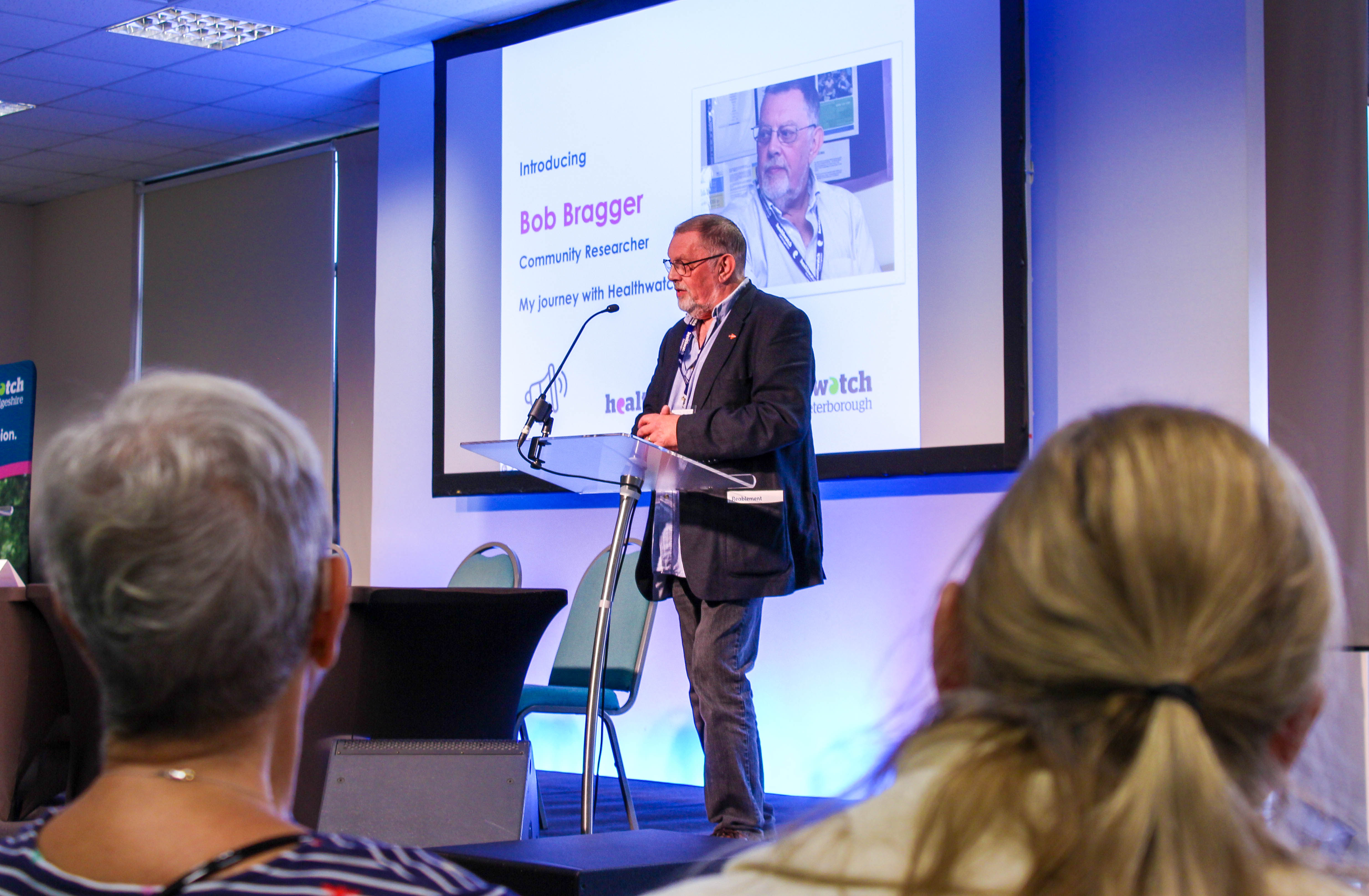 Healthwatch volunteer Bob Bragger delivers presentation