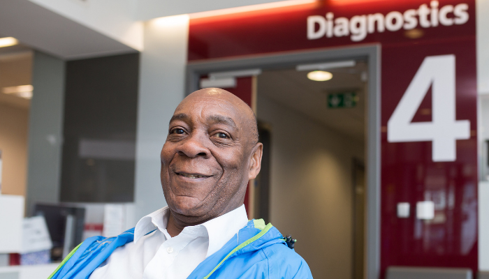 man sitting in hospital diagnostics area