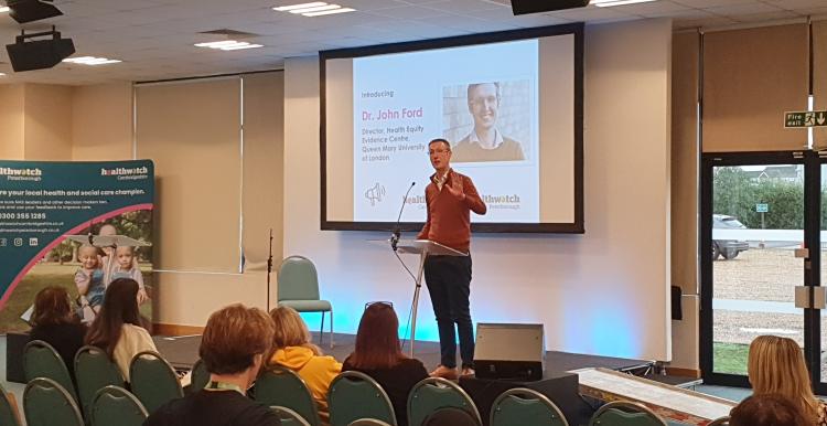 Dr John Ford address the audience