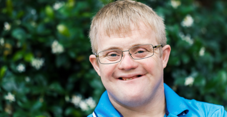 The Government wants to hear about your lived experiences young man smiling at camera