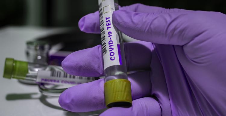 Anyone aged five and over in the UK with symptoms can now be tested holding a coronavirus test