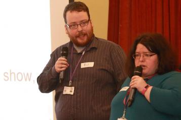 two young people doing a presentation