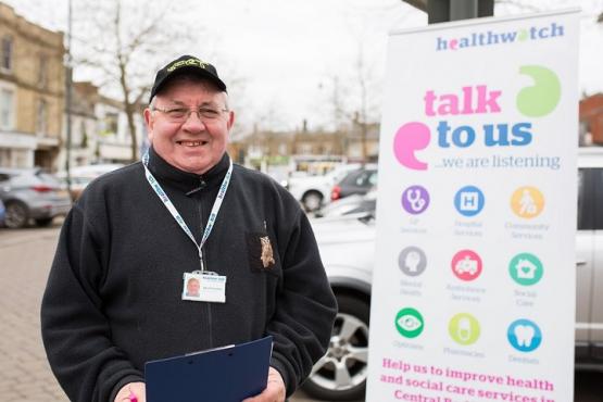 Healthwatch volunteer smiling at the camera