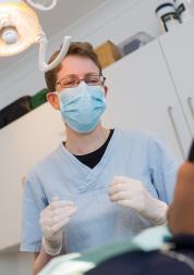 Dentist treating patient