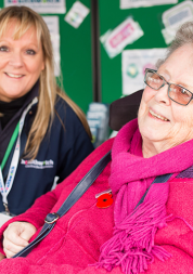 Woman in wheelchair with Healthwatch staff member