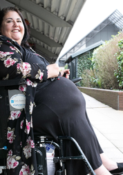 Woman in wheelchair outside
