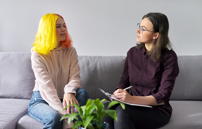 Picture shows teenage girl in counselling session